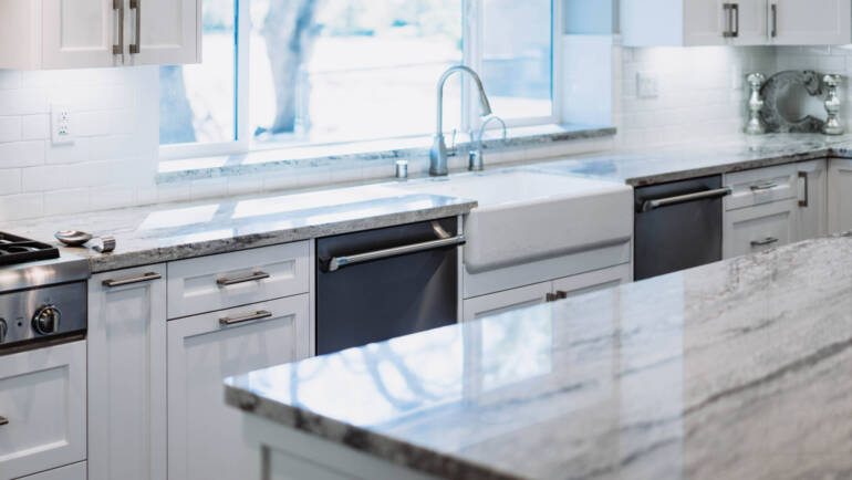 COMPARING KITCHEN COUNTERTOP MATERIALS: CORIAN, QUARTZ, AND GRANITE – WHICH ONE REIGNS SUPREME?